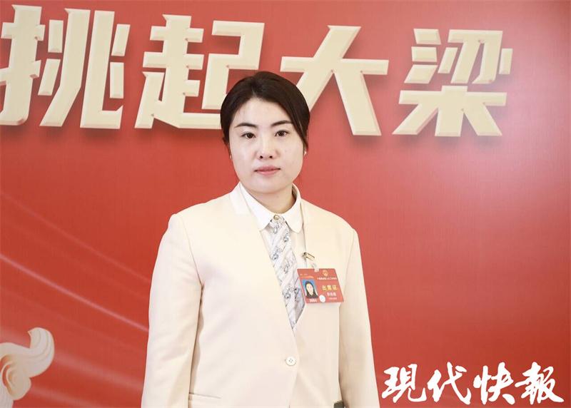 两会快访谈全国人大代表李肖娜90后社区书记基层治理有妙招