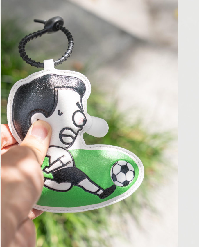 “苏超”主题捏捏乐挂件。受访者供图